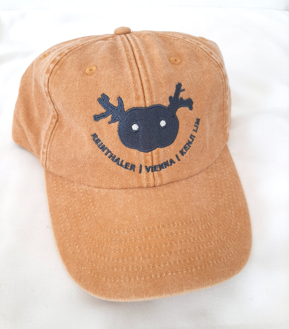 Vintage mustard artist cap by Kenji Lim